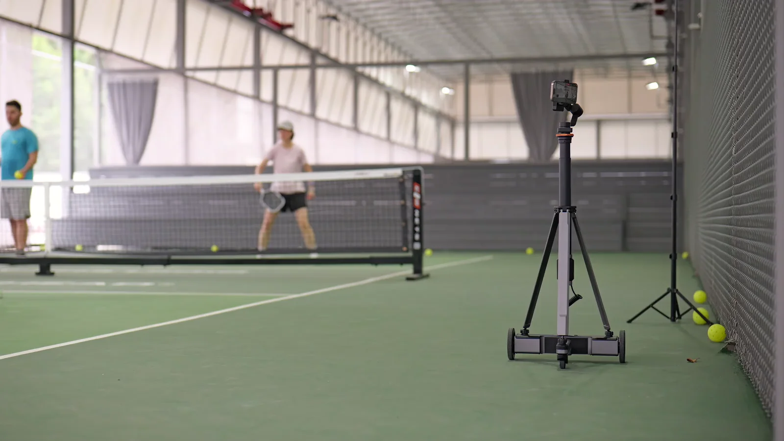 Tribot filming a pickleball rally