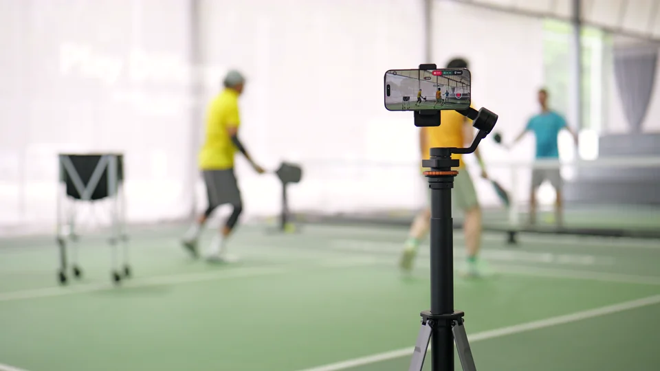 The Tribot phone gimbal filming pickleball players on court