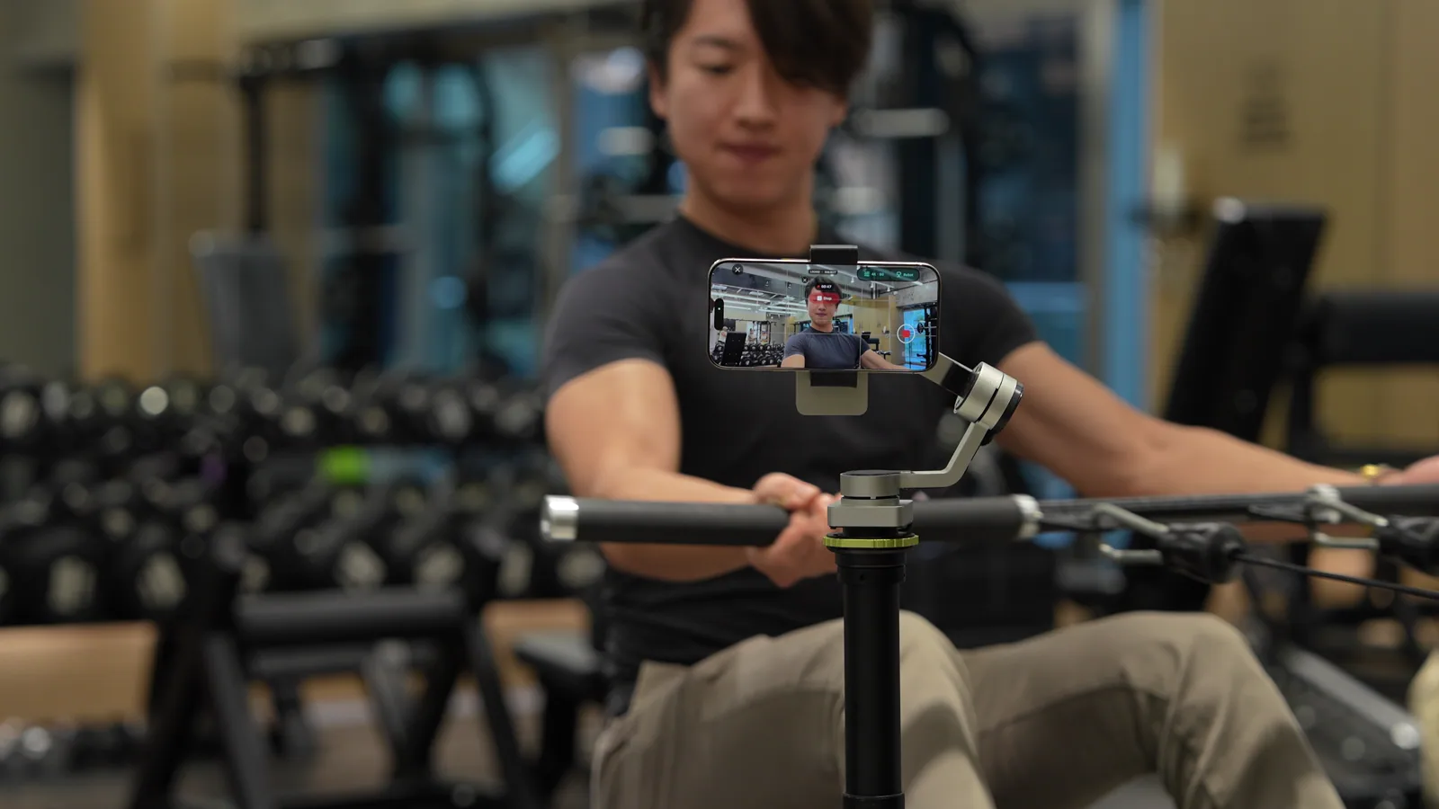 Tribot filming a workout in the gym