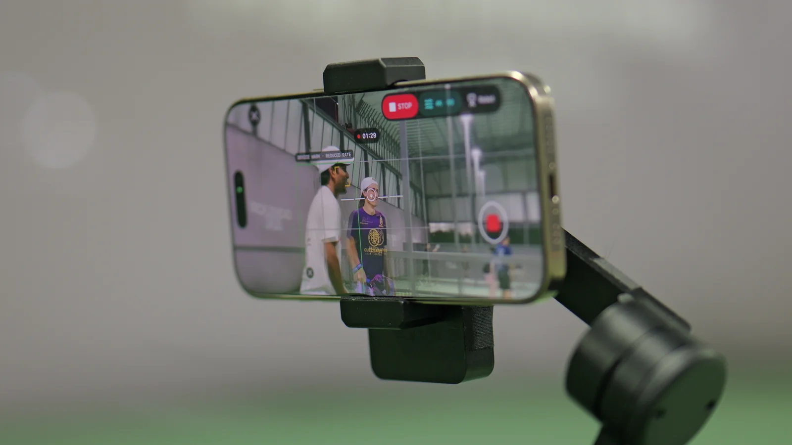 Pickleball players visible on a phone recording with the Tribot gimbal
